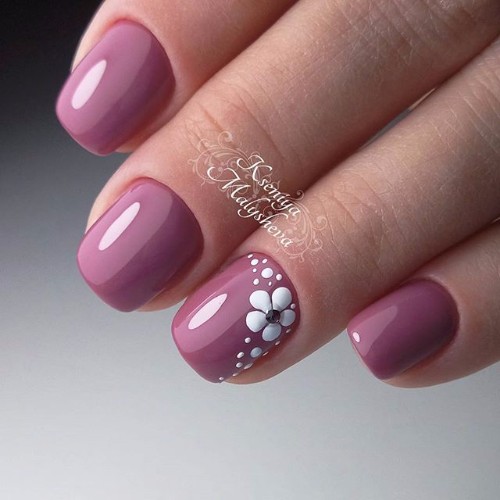 dark pink nails with flower design