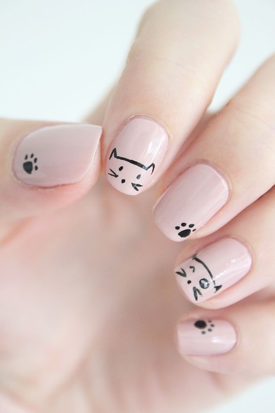 beige nails with cats and cat paws