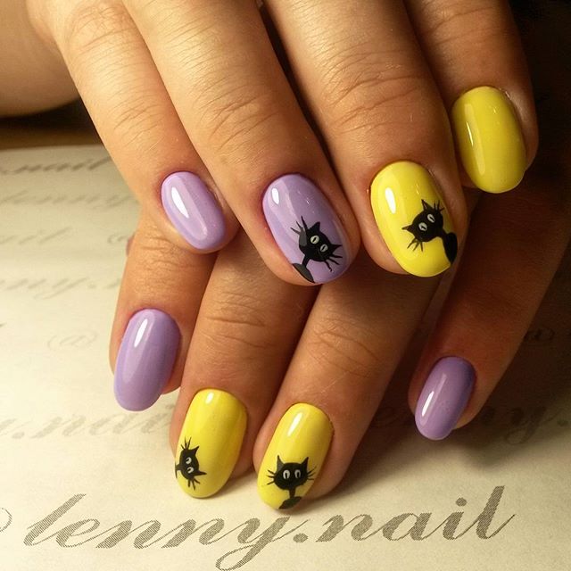 yellow and lily nails with cats