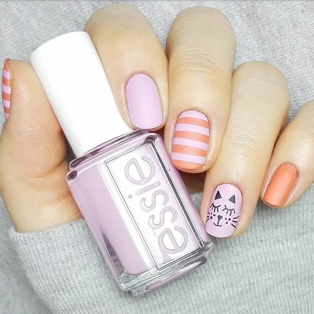 pastel nails with stripes and cat design