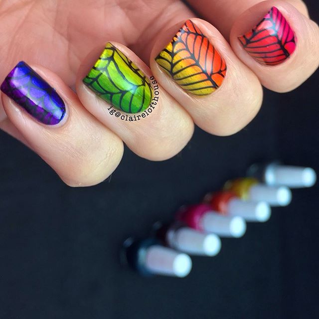 bright colorful spider web on nails