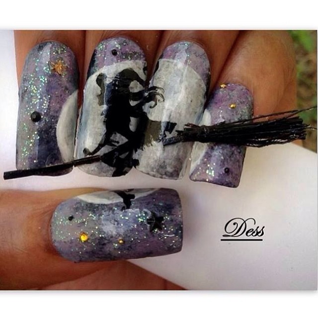 halloween nails with a witch on a 3D broom