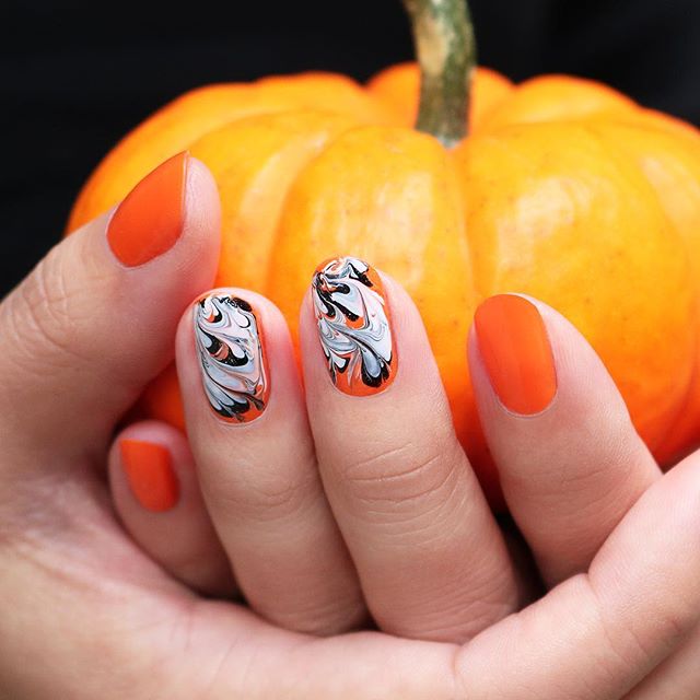 simple halloween nails - orange and marble