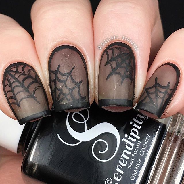 clear black nails with dark spider web