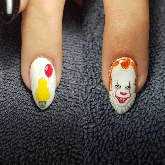 halloween nails with a clown and a balloon