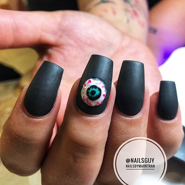 black nails with human eyes for Halloween