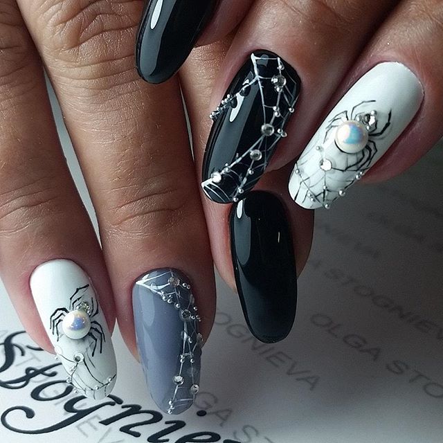 white and black spider web nails with pearls