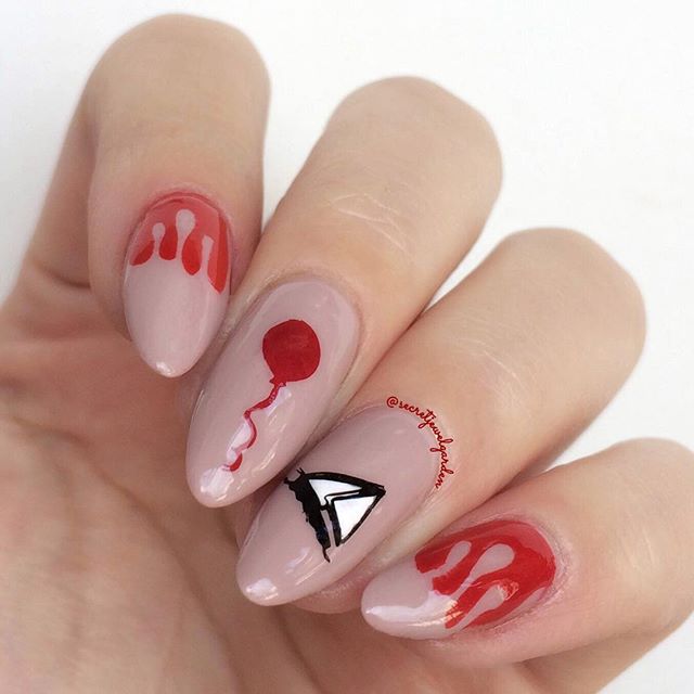 it pennywise nail design with blood and red balloon