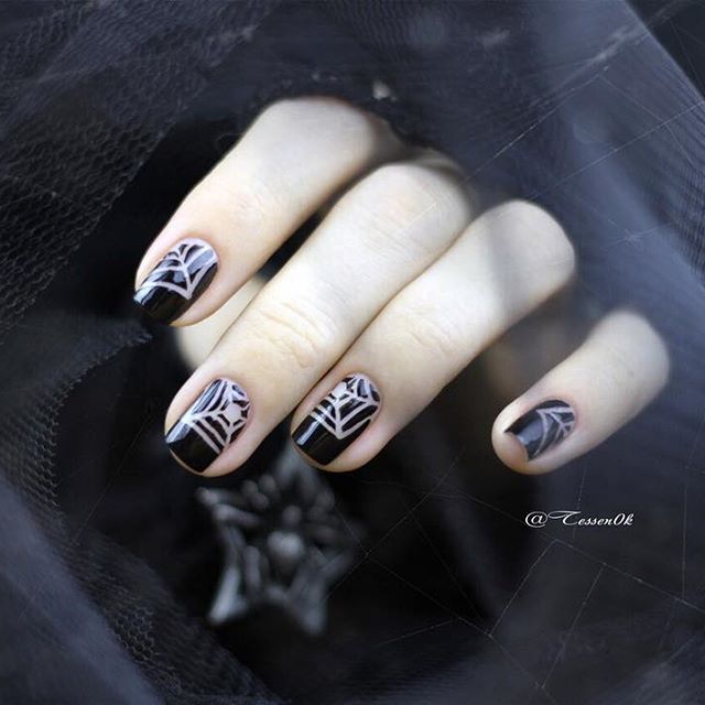 black nails with spider web