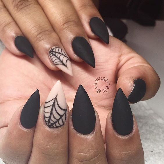 halloween black matte nails with spider web
