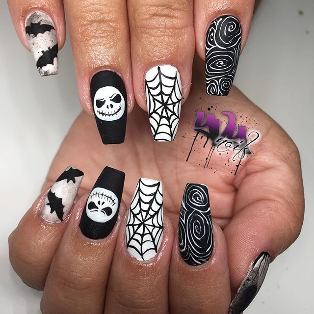 Jack Skellington manicure with spider web nail design